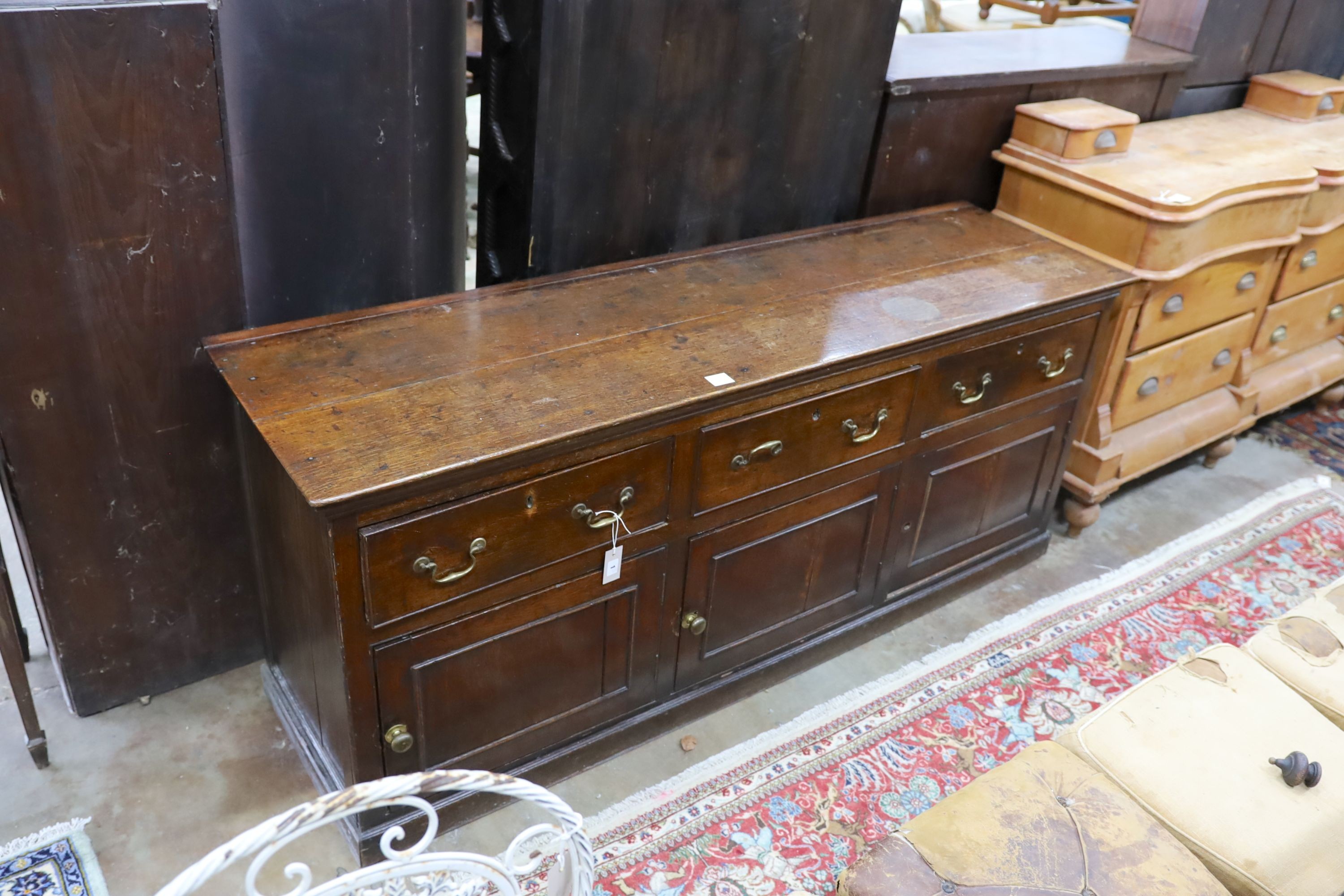 An 18th century oak dresser base, length 189cm, depth 53cm, height 79cm